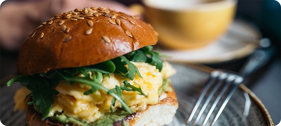 egg, arugula, guacamole breakfast bun